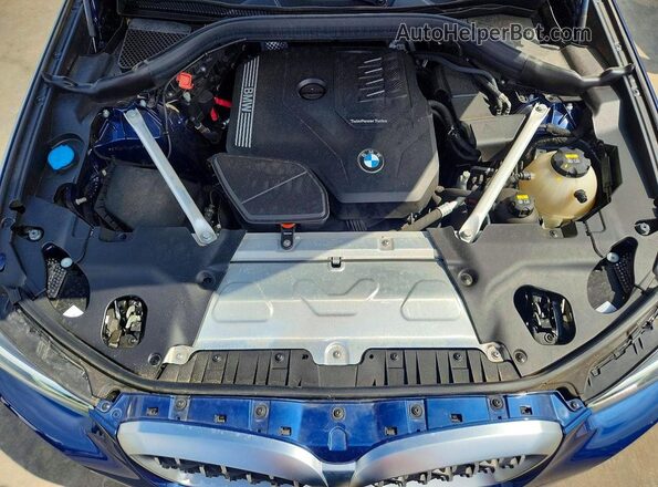 5UX33DT03N9K73863 2022 BMW X4 Blue Widok wnętrza z tyłu