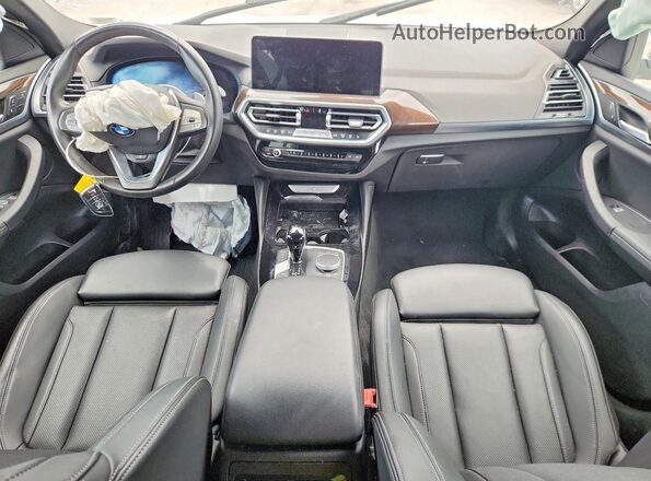 5UX33DT03R9W98912 2024 BMW X4 White Dashboard view