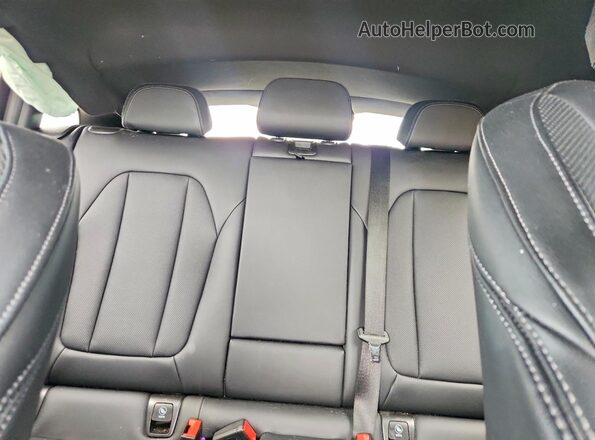 5UX33DT03R9W98912 2024 BMW X4 White Rear seats view