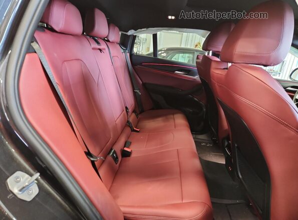 5UX33DT03S9X59519 2025 BMW X4 Charcoal Вид задньої частини салону