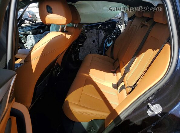 5UX33DT04P9S77567 2023 BMW X4 Blue Սալոնի հետևի տեսք