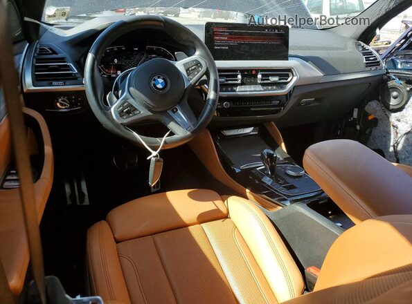 5UX33DT04P9S77567 2023 BMW X4 Blue Առջևի վահանակի տեսք