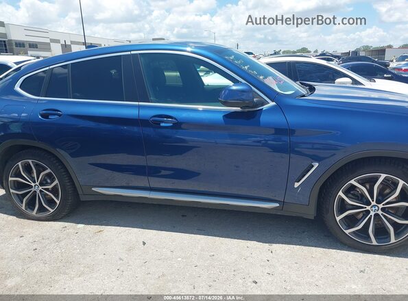 5UX33DT05P9R33310 2023 BMW X4 Blue უკანა სალონის ხედი