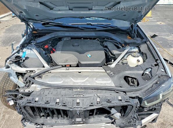 5UX33DT08S9Y15390 2025 BMW X4 Gray Rear interior view