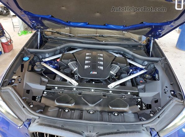 5UX33EU03S9Y30867 2025 BMW X5 Blue Սալոնի հետևի տեսք