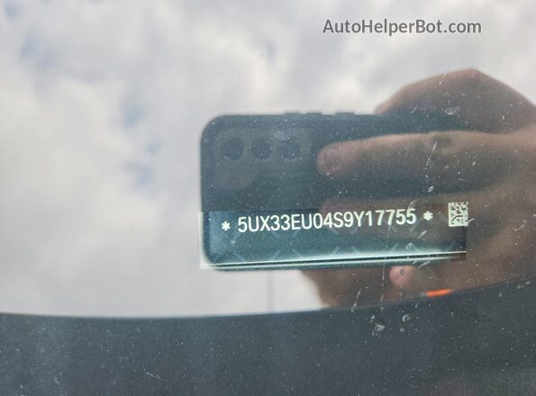 5UX33EU04S9Y17755 2025 BMW X5 Black VIN կոդի պիտակի տեսք