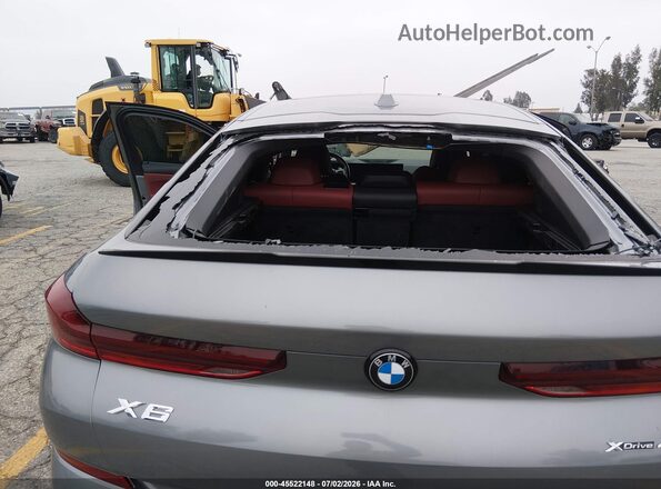 5UX33EX01R9U31882 2024 BMW X6 Gray Vista interior trasera