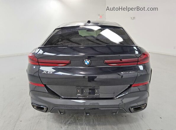 5UX33EX02T9280462 2026 BMW X6 Black Вид ззаду