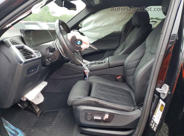 5UX33EX05R9U96573 2024 BMW X6 Black Вид салону спереду