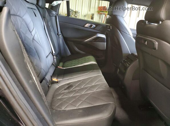 5UX33EX05R9U96573 2024 BMW X6 Black Вид задніх сидінь