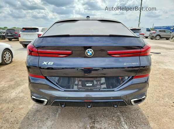 5UX33EX05S9X22911 2025 BMW X6 Black Vista trasera