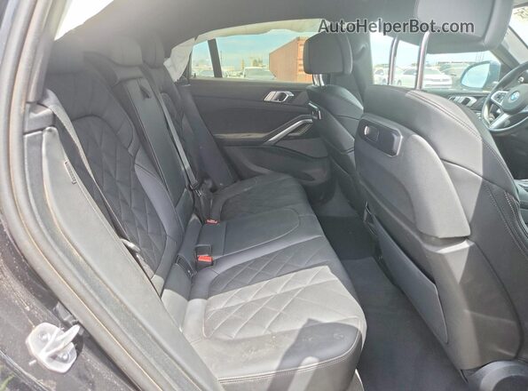 5UX33EX08S9X01227 2025 BMW X6 Black Vista interior trasera