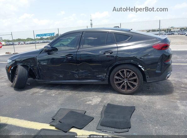 5UX33EX09S9W32242 2025 BMW X6 Black Панорамний вид салону 360°