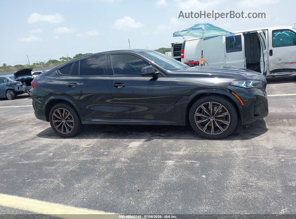 5UX33EX09S9W32242 2025 BMW X6 Black Вид задньої частини салону