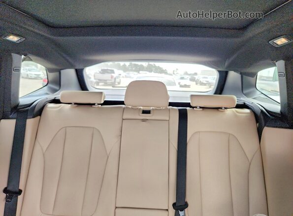5UX43DP04R9X38817 2024 BMW X3 Black Vista interior trasera