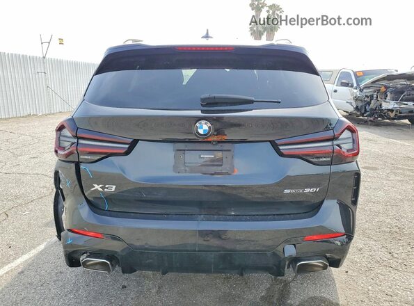 5UX43DP06N9L57545 2022 BMW X3 Black Vista trasera