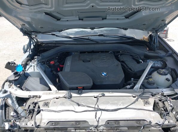 5UX43DP08P9N81354 2023 BMW X3 Light Blue Vista trasera