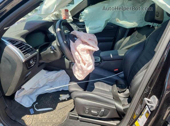 5UX43DT01R9U35760 2024 BMW X4 Black წინა სალონის ხედი