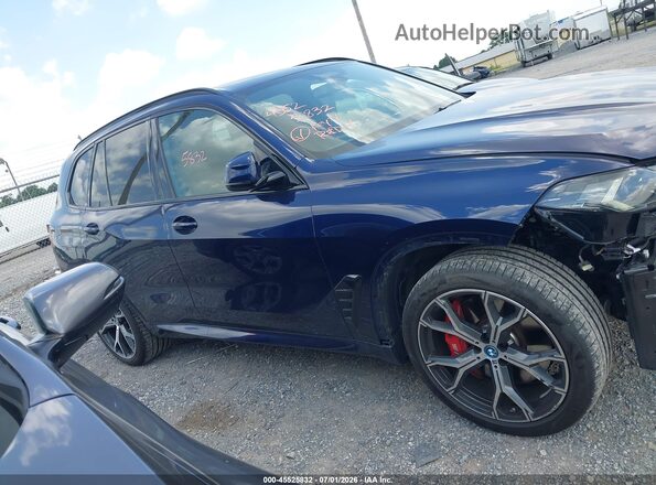 5UX43EU09S9W80431 2025 BMW X5 Blue Widok wnętrza z tyłu