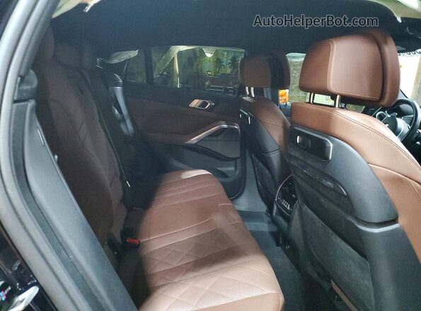 5UX43EX06S9Y05283 2026 BMW X6 Blue Вид задньої частини салону