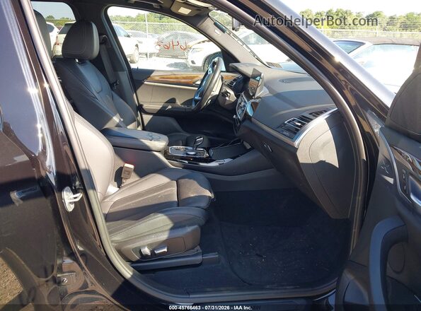 5UX53DP00N9L95051 2022 BMW X3 Black Front interior view