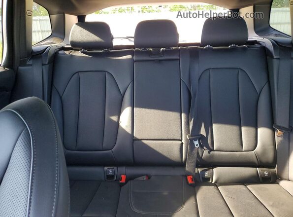 5UX53DP00P9R38739 2023 BMW X3 Black Rear seats view