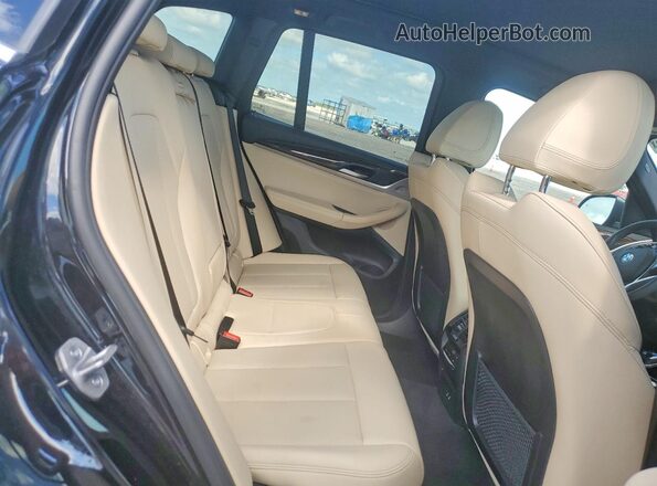 5UX53DP01R9V10889 2024 BMW X3 Black Vista interior trasera