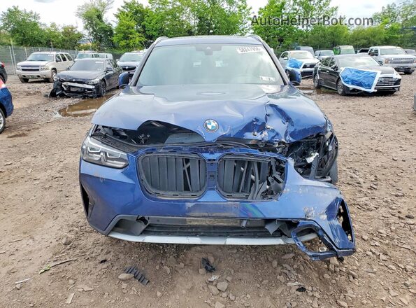 5UX53DP09N9M16804 2022 BMW X3 Blue Vista frontal