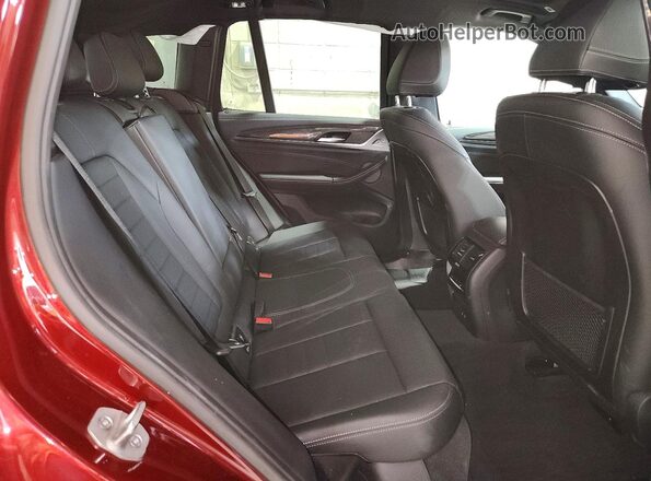 5UX83DP03R9U24612 2024 BMW X3 Темно-бордовый Вид задней части салона