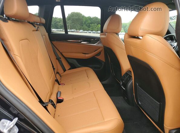 5UX83DP04R9X00859 2024 BMW X3 Black Вид задньої частини салону