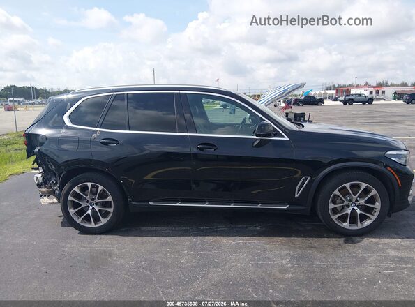 5UXCR4C02P9P21365 2023 BMW X5 Black Панорамний вид салону 360°