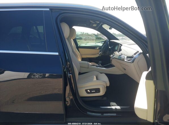 5UXCR4C04L9B26224 2020 BMW X5 Black Vista interior delantera