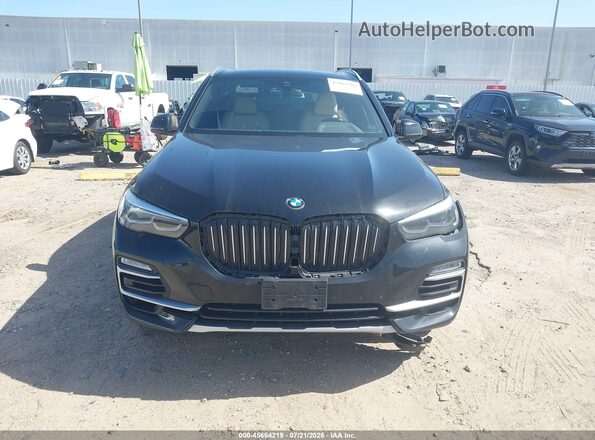 5UXCR4C04L9B26224 2020 BMW X5 Black Vista interior trasera