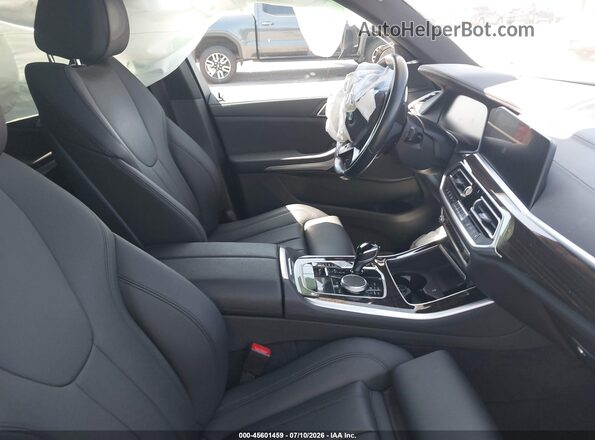 5UXCR4C07M9F09625 2021 BMW X5 Blue Front interior view