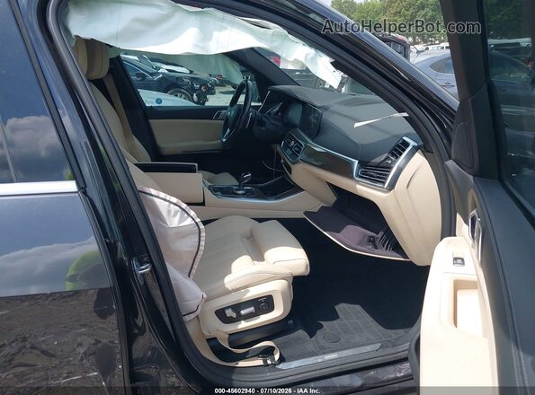 5UXCR4C08LLW63792 2020 BMW X5 Dark Brown Вид салону спереду