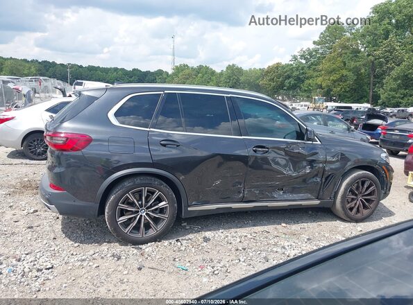 5UXCR4C08LLW63792 2020 BMW X5 Dark Brown Вид задньої частини салону
