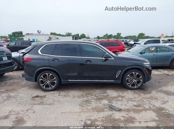 5UXCR4C09M9F52959 2021 BMW X5 Black Widok wnętrza z tyłu