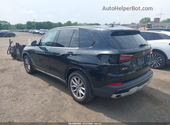 5UXCR6C04M9D86605 2021 BMW X5 Black Front view