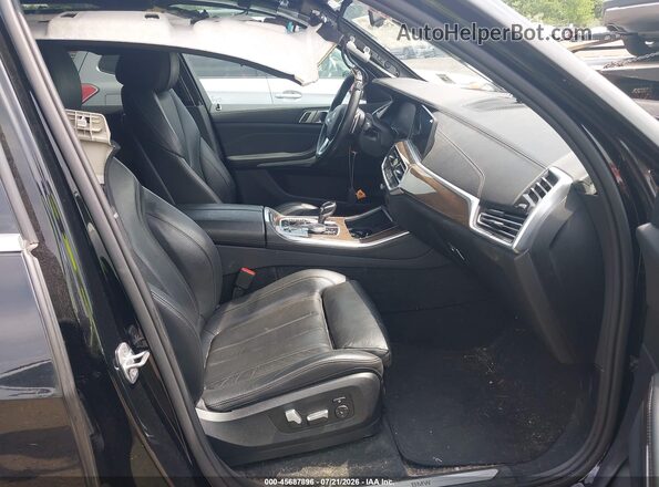 5UXCR6C04M9D86605 2021 BMW X5 Black Front interior view