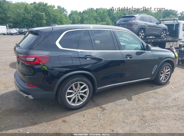 5UXCR6C04M9D86605 2021 BMW X5 Black Rear interior view