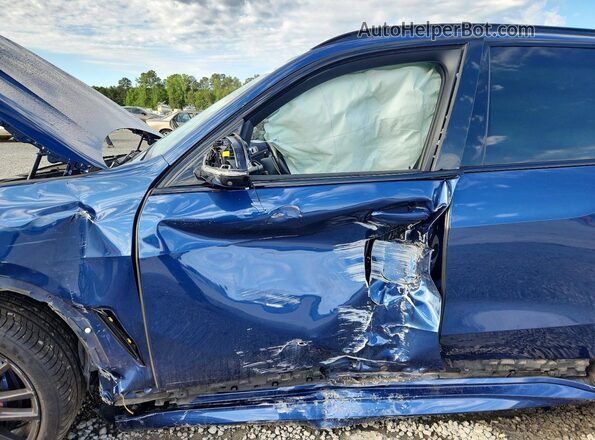 5UXCR6C04P9N69245 2023 BMW X5 Blue Front interior view