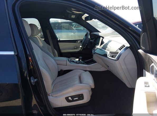 5UXCR6C09L9B94501 2020 BMW X5 Black Front interior view