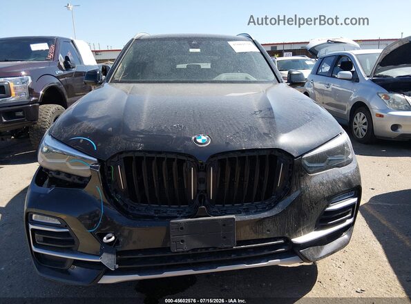 5UXCR6C09L9B94501 2020 BMW X5 Black Rear interior view