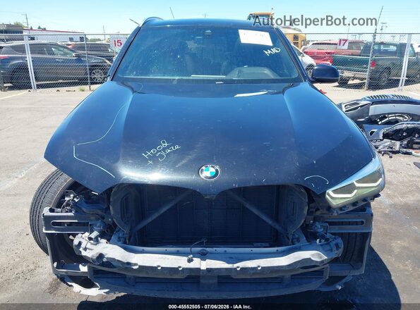 5UXCR6C5XKLL21430 2019 BMW X5 Black Vista interior trasera