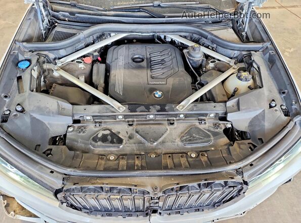5UXCW2C00L9B98678 2020 BMW X7 White Widok komory silnika