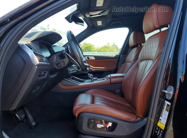 5UXCW2C04M9F58911 2021 BMW X7 Black Vista interior delantera