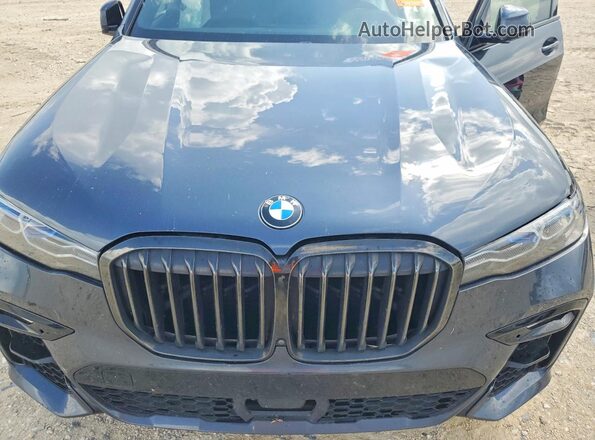 5UXCX6C07N9M11002 2022 BMW X7 Black Vista interior trasera