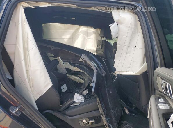 5UXCX6C07N9M11002 2022 BMW X7 Black Vista de los asientos traseros