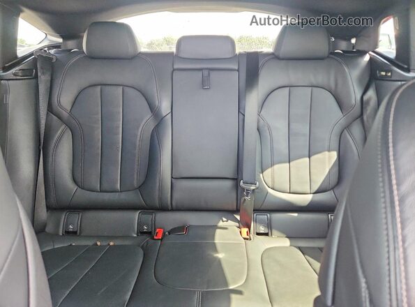 5UXCY6C01M9G25210 2021 BMW X6 Бордовый Вид задних сидений