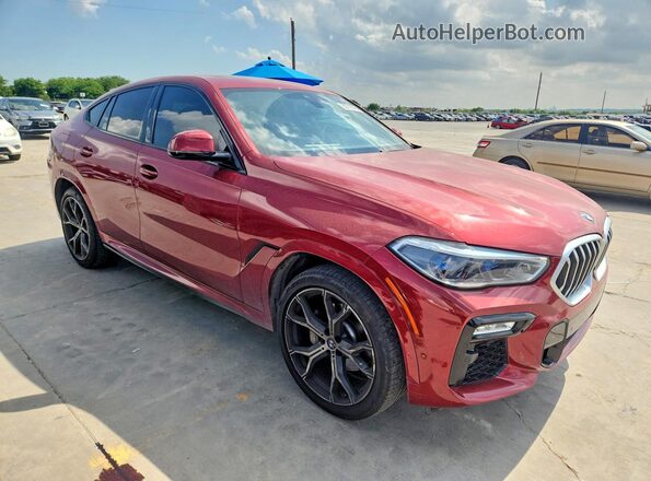 5UXCY6C01M9G25210 2021 BMW X6 Бордовый Передняя правая четверть